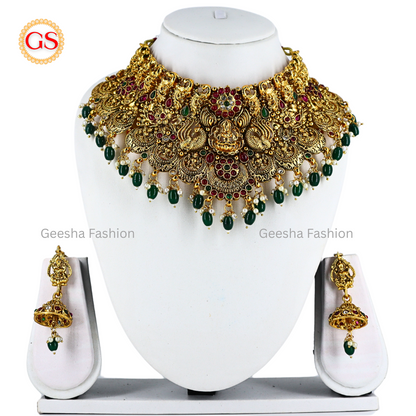 Lakshmi And Peacock Design Antique Chokkar And Jumka Set With Green Beads